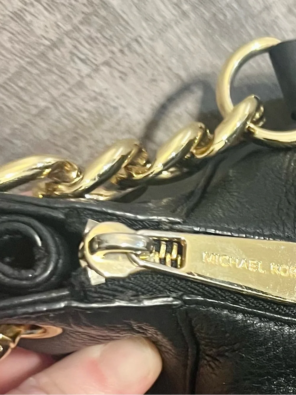 Michael Kors Black Pebbled Leather Hobo with Gold-Tone Tassel Charm